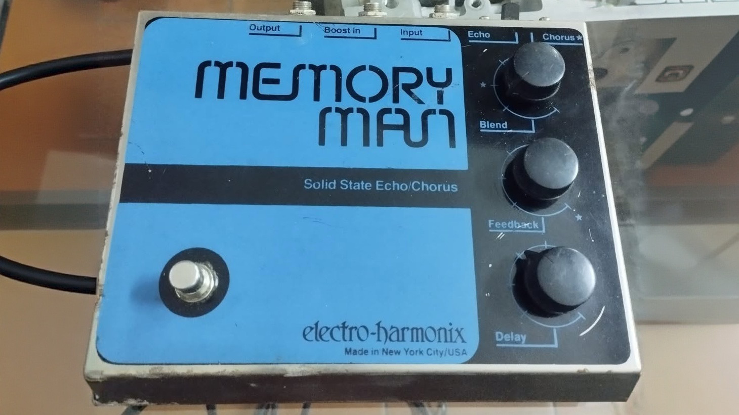Three-knob Electro-Harmonix Memory Man, sometimes called the 'economy Memory Man', with a blue graphic panel.
