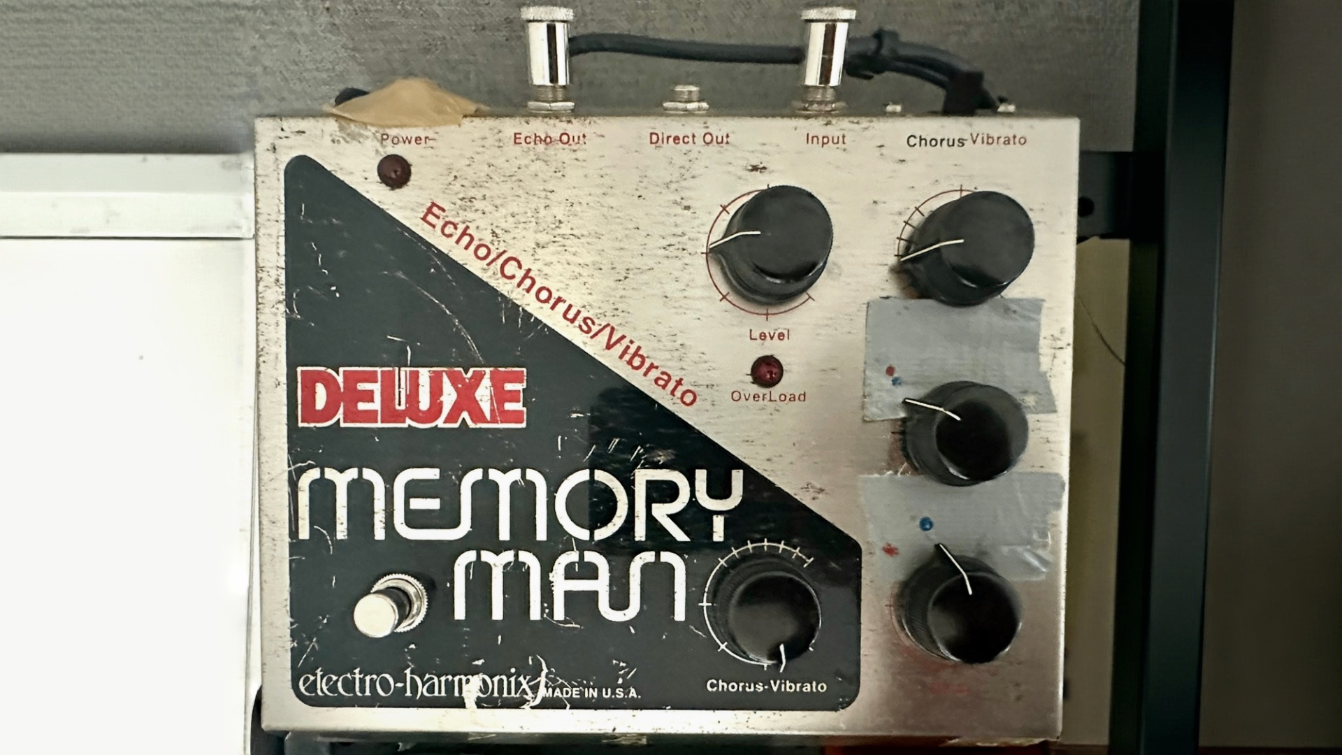 Cornel Lazar's early-1990s reissue Electro-Harmonix Deluxe Memory Man, showing years of wear on the silver enclosure.