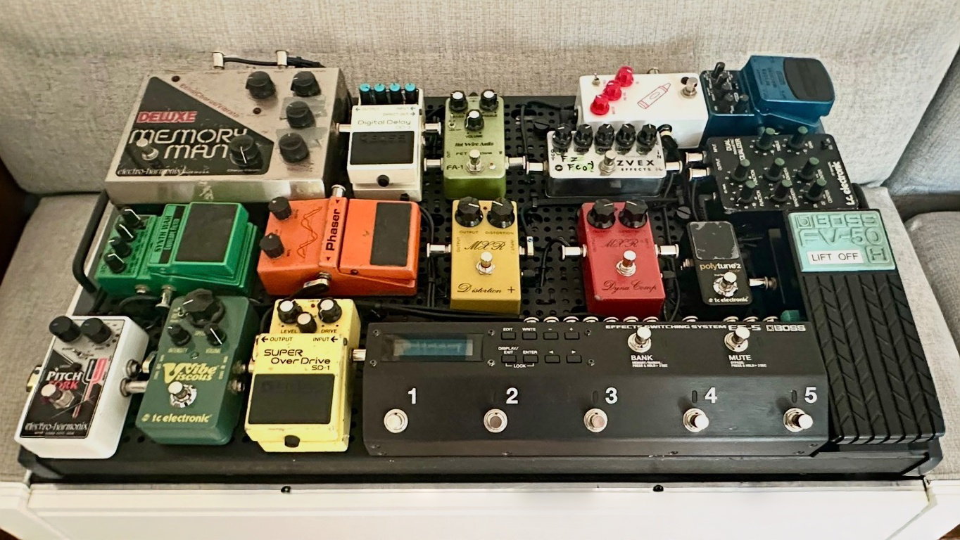 Cornel Lazar's pedalboard in July 2026, with a large-box Electro-Harmonix Deluxe Memory Man reissue in the top-left position.